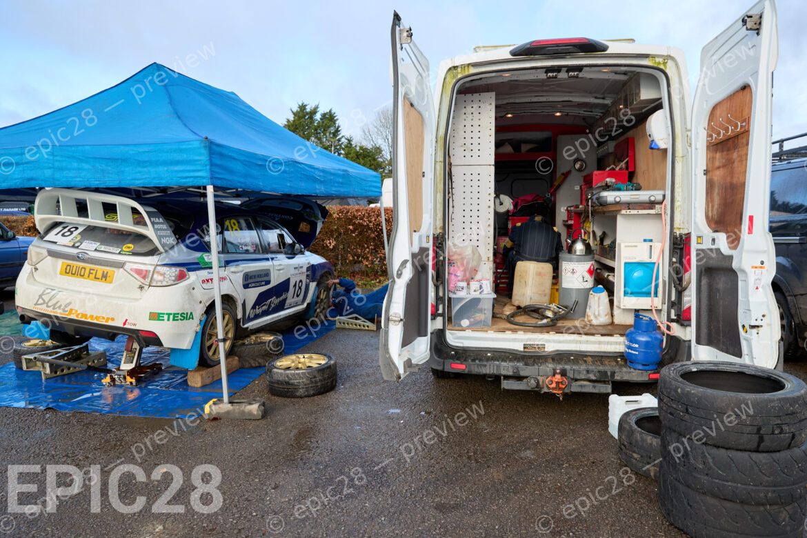 Castle Combe Race Circuit, England, 29th Nov 2025, Richard Barrow and Courtney Barrow in the paddock with mechanics working on the Subaru STI N14 at the DAE Castle Combe Stage Rally. Credit: Craig Allan-McWilliams/Alamy Live News