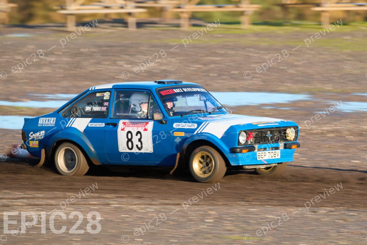 Donington Park, England, 30th Nov 2025, No83, David Turner of EMCOS and Kelan Watkins of North Humberside MC race in a Ford Escort at the Tegiwa Donington Rally 2025 at Donington Park on 30th Nov 2025. Credit: Craig Allan-McWilliams/Alamy Live News