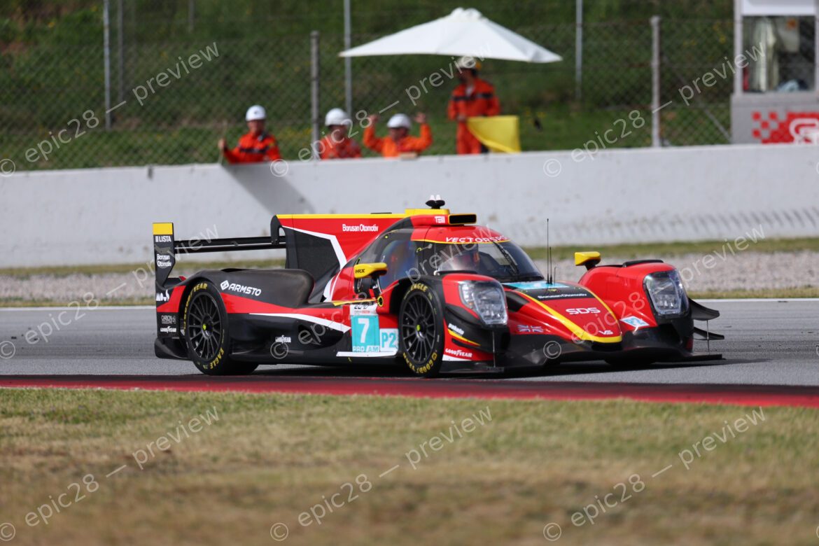 Barcelona, Spain. 11th Apr 2026. #7 Oreca 07 - Gibson of Jens Reno MØLLER (DEN) and Cem BÖLÜKBAŞI (TUR) and TBC (VECTOR SPORT) LMP2 prototype maintains high speed through the circuit's sweeping curves during the second free practice session. Track marshals remain alert on the perimeter as the car pushes toward its limit.. Credit: Tracey Allan-McWilliams/Alamy Live News
